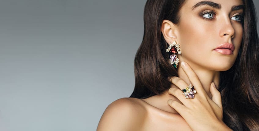 Jewelry Connection Dalton GA, beautiful woman wearing elegant ring and earrings